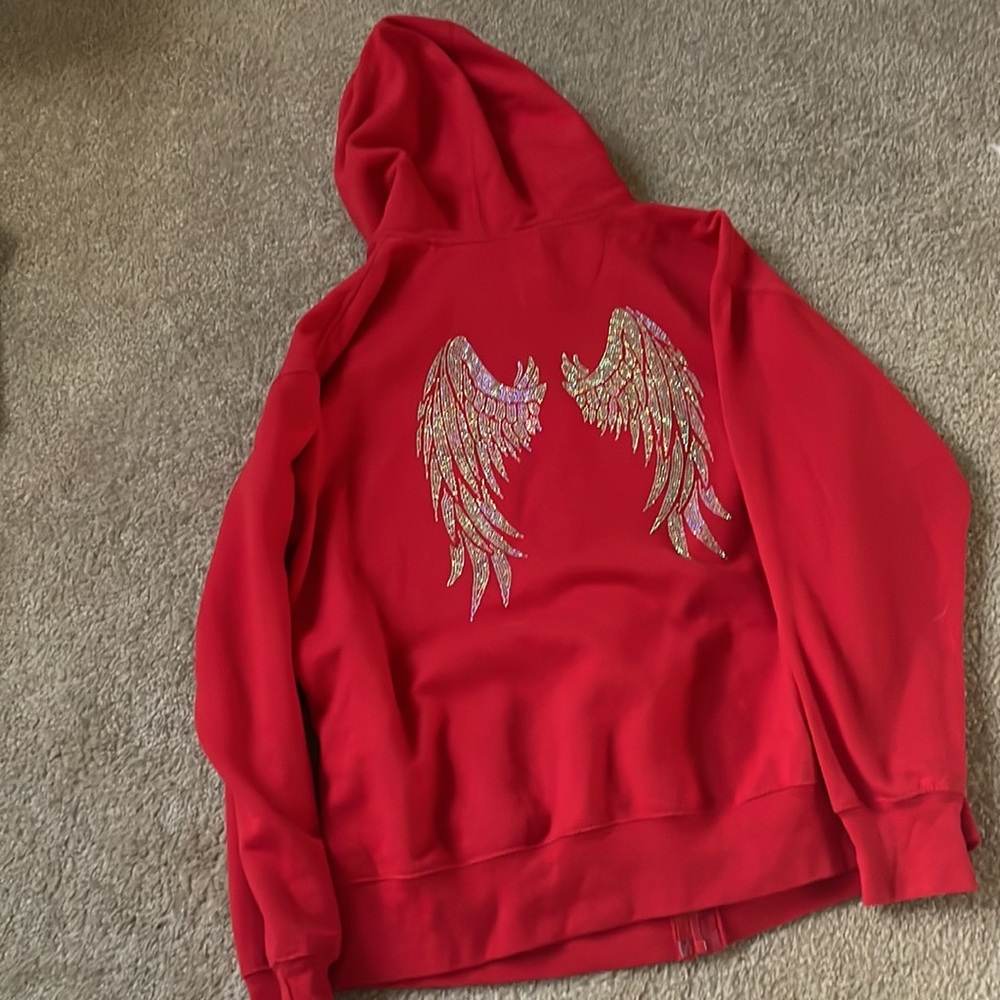 A Large Red Sweater With A Design By Smart Blanks - image 2